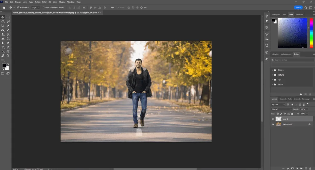 young person is walking around through the woods