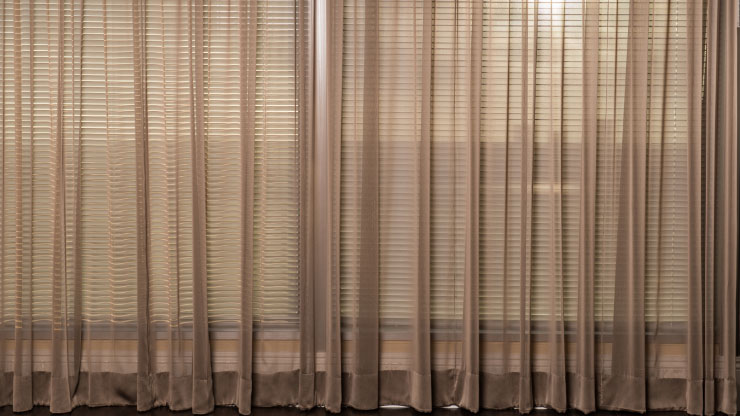 Large Windows with Sheer Curtains