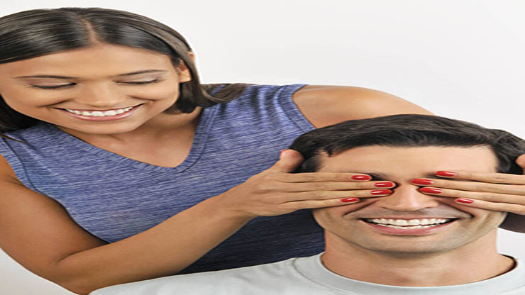 Blindfold pose or cupping hands over eyes